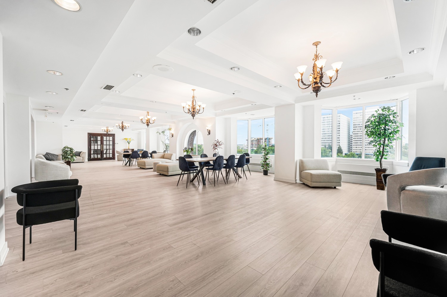 View of a living room with bay window of a studio for rent in Montreal